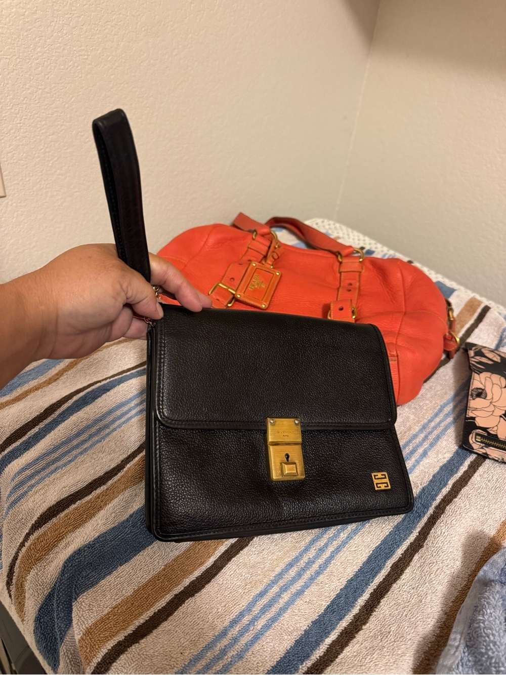vintage Givenchy emblem handbag in black leather with gold hardware. Lock w/keys